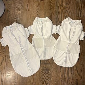 Set of three official Snoo sleep sacks! Sizes s,m, and l